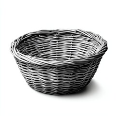 Obraz premium A simple, woven basket with a rounded shape, displayed in black and white, showcasing intricate craftsmanship.