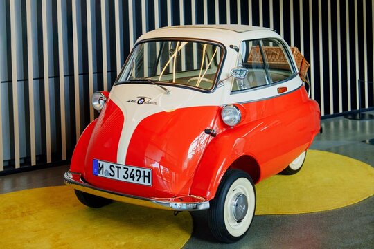 The BMW Isetta was a popular microcar produced by BMW from 1955 to 1962. The Isetta is known for its unique design, which features a single door at the front of the car.