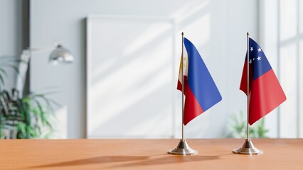 FLAGS OF PHILIPPINES AND SAMOA ON TABLE