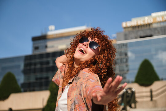 Carefree tourist enjoying sunny day in Madrid city center