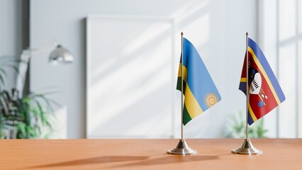 FLAGS OF RWANDA AND SWAZILAND ON TABLE