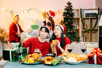 Holiday spirit with Asian friends exchanging gifts, sharing laughs, and enjoying a festive Christmas