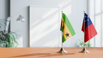 FLAGS OF SAMOA AND SAO TOME ON TABLE
