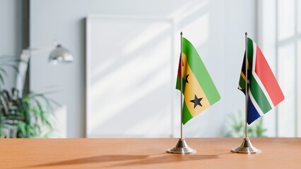 FLAGS OF SAO TOME AND SOUTH AFRICA ON TABLE