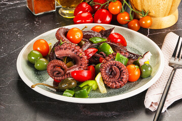 Salad with octopus tentacle and vegetables