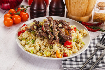 Traditional couscous with beef and vegetables