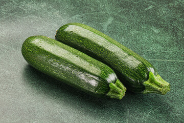 Raw green ripe zucchini vegetable