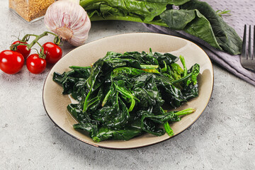 Coocked green spinach with oil