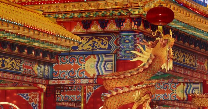Beijing, China. Large Lantern Composition At Zigong Lantern Festival. National Color. Traditional Red Chinese Gate Paifang, Pailou, close up View. Chinese Dragon Are Mythological Bird. Symbolize
