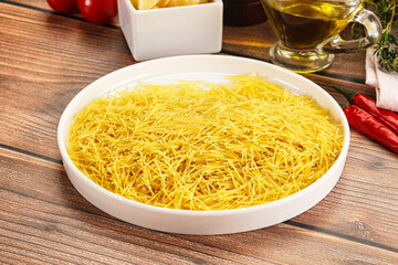 Raw dry Italian pasta Vermicelli