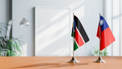 FLAGS OF SOUTH SUDAN AND TAIWAN ON TABLE