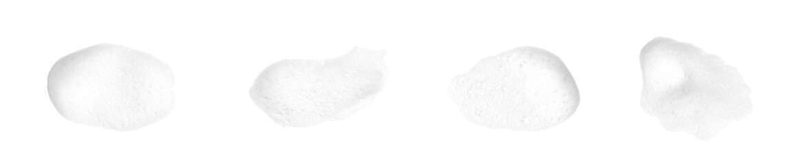 Set of white soap bubbles, shampoo or shower gel, isolated on white background. Textured and contrasting background. Soap bubbles in the bath, shaving cream gel, bubble bath.