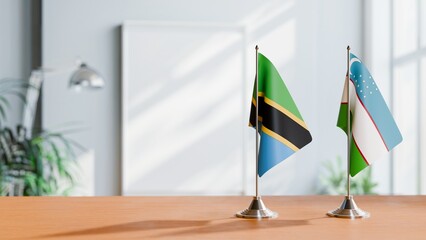 FLAGS OF TANZANIA AND UZBEKISTAN ON TABLE