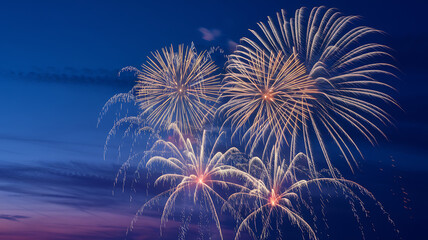 A photo of a vibrant fireworks display against a charcoal-gray sky with faint metallic undertones