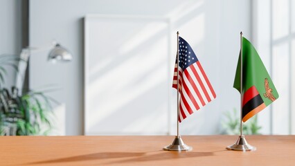 FLAGS OF USA AND ZAMBIA ON TABLE