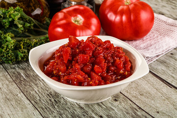 Diced ripe tomato with sauce