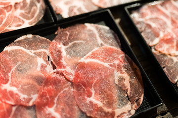 Fresh raw pork, meat ,beef, belly, sliced on square plate, shabu, hot pot