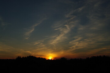 Obraz premium sunset over the clouds