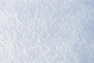 Fresh sparkling gradient snow close-up, perfect as a winter season background or texture