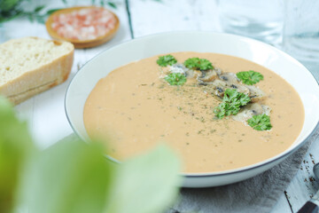 A bowl with mushroom cream soup