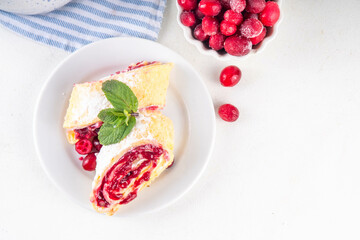 Cranberry strudel, winter roll dessert with cranberry jam