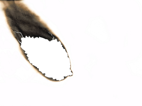 burned hole white paper background texture. Burn in paper with brown edges and flames isolated on a transparent background