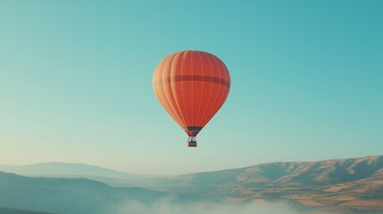 soaring hot air balloon in a clear blue sky, representing freedom, elevation, and achieving goals in a limitless horizon