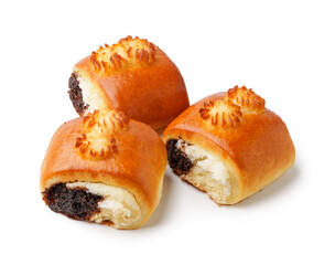 Freshly baked sweet rolls with a creamy filling and chocolate center arranged on a white background
