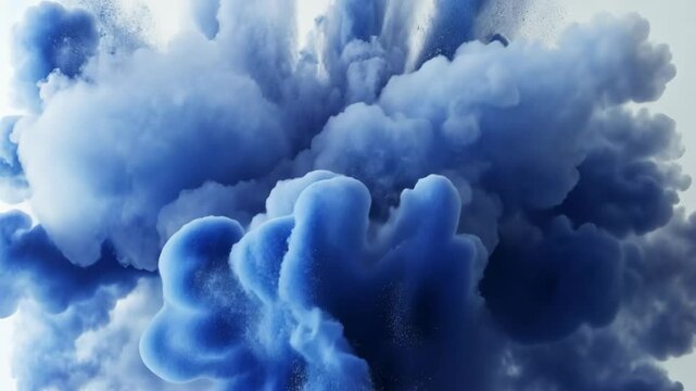 Slowly spreading light blue blue powder splash ink cloud creates a beautiful abstract effect in water against a white backdrop Paint holi