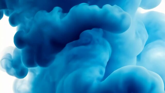 Slowly spreading light blue blue powder splash ink cloud creates abstract effect in water against a white backdrop Paint holi
