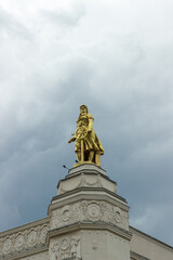 Exhibition of Achievements of National Economy (VDNKh), golden statue on the roof of the building. Moscow, Russia.