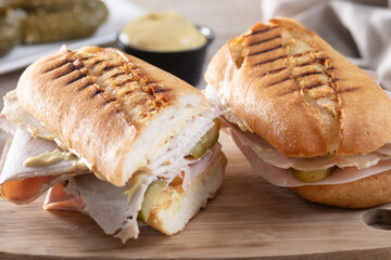 Traditional Cuban sandwich on wooden table