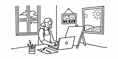 Creative young woman working on laptop in her studio