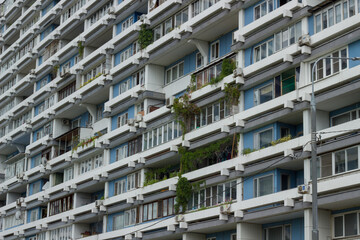 Textured facades of blue residential buildings in the Severnoye Chertanovo district. Moscow, Russia.