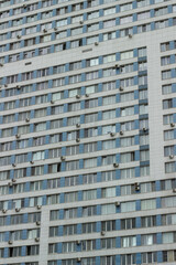 Textured facades of blue residential buildings in the Severnoye Chertanovo district. Moscow, Russia.