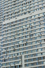 Textured facades of blue residential buildings in the Severnoye Chertanovo district. Moscow, Russia.