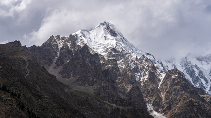 Scenic detail view of Nanga Parbat north face with Rakhiot peak under cloudy sky, Tarishing, Astore, Gilgit-Baltistan, Pakistan