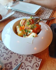 Tipical Spanish food: Bravas chips, dices potatoes fried with spicy sauce.
