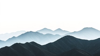 Misty mountain layers fading into distance under soft light.
