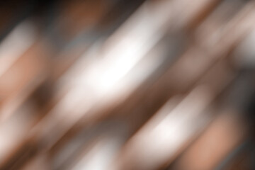 Brown, mocha mousse blurred gradient background. Mixed motion texture. Abstract diagonal lines wallpaper. Demonstrating color, trend 2025 year