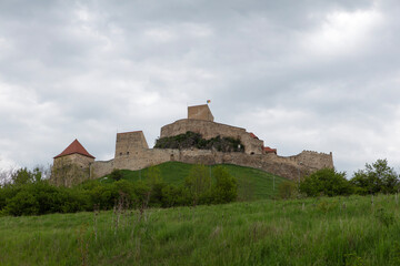 Romania ancient fortress Rupea on a cloudy summer day