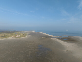 aerial drone view of the beach at Texel, The Netherlands, dunes and sand.