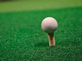 Golf ball on the background of the screen. Screen golf concept