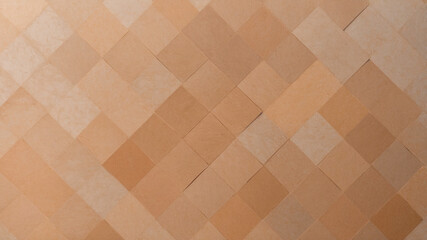 A creative display of diamond-shaped beige textures forming an intricate geometric pattern in soothing tones.