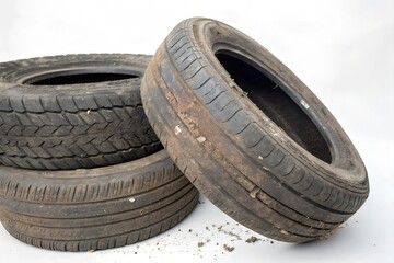 old worn damaged tires isolated on a white background as a drawing of a damaged tire for advertising a tire service or car tire store