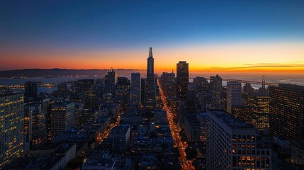 Fototapeta premium 5. A city skyline at dawn, with the first light of the day beginning to illuminate the buildings and streets.