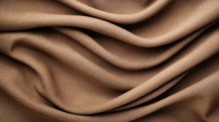 A close-up of brown fabric draped in smooth, flowing waves, showcasing elegance and texture in a detailed display of the fabric’s rich color and intricate folds.