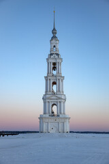 Winter morning at the ancient bell tower of St. Nicholas Cathedral. Kalyazin. Tver region, Russia