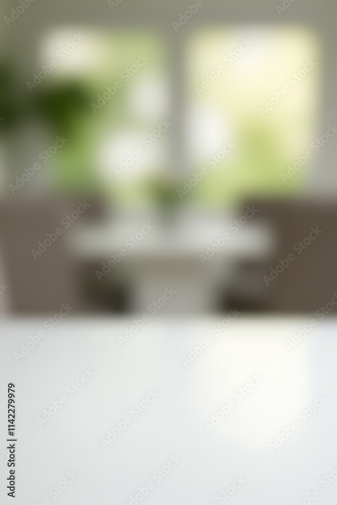Poster The white table top is in sharp focus while its surroundings are intentionally blurred into an abstract background._00001_