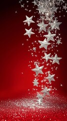 Silver christmas stars falling on red glitter background